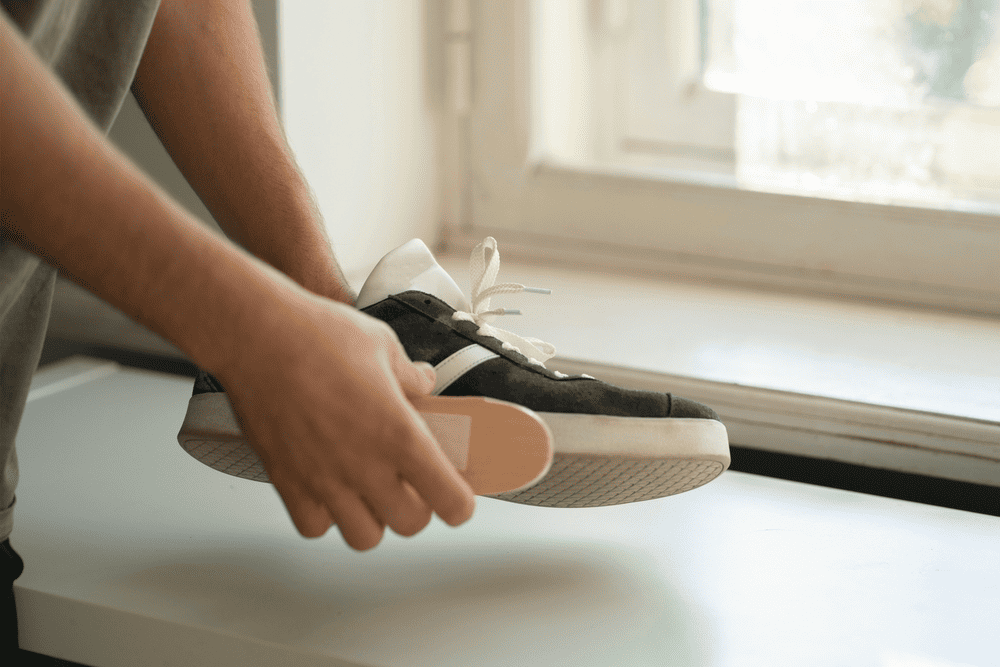 Clean sneakers by hand